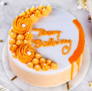 Orange & White Floral Cake with Drizzle - Image 3